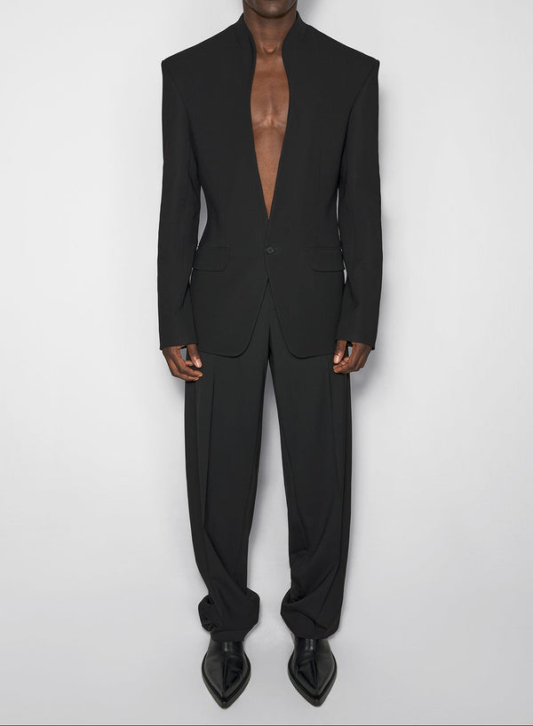black collarless tailored jacket