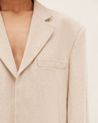 LA VESTE D'HOMME BEIGE