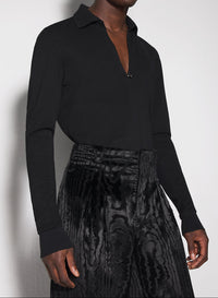 black pierced polo