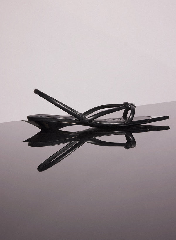 black leather knotted flat sandals