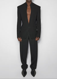 black collarless tailored jacket