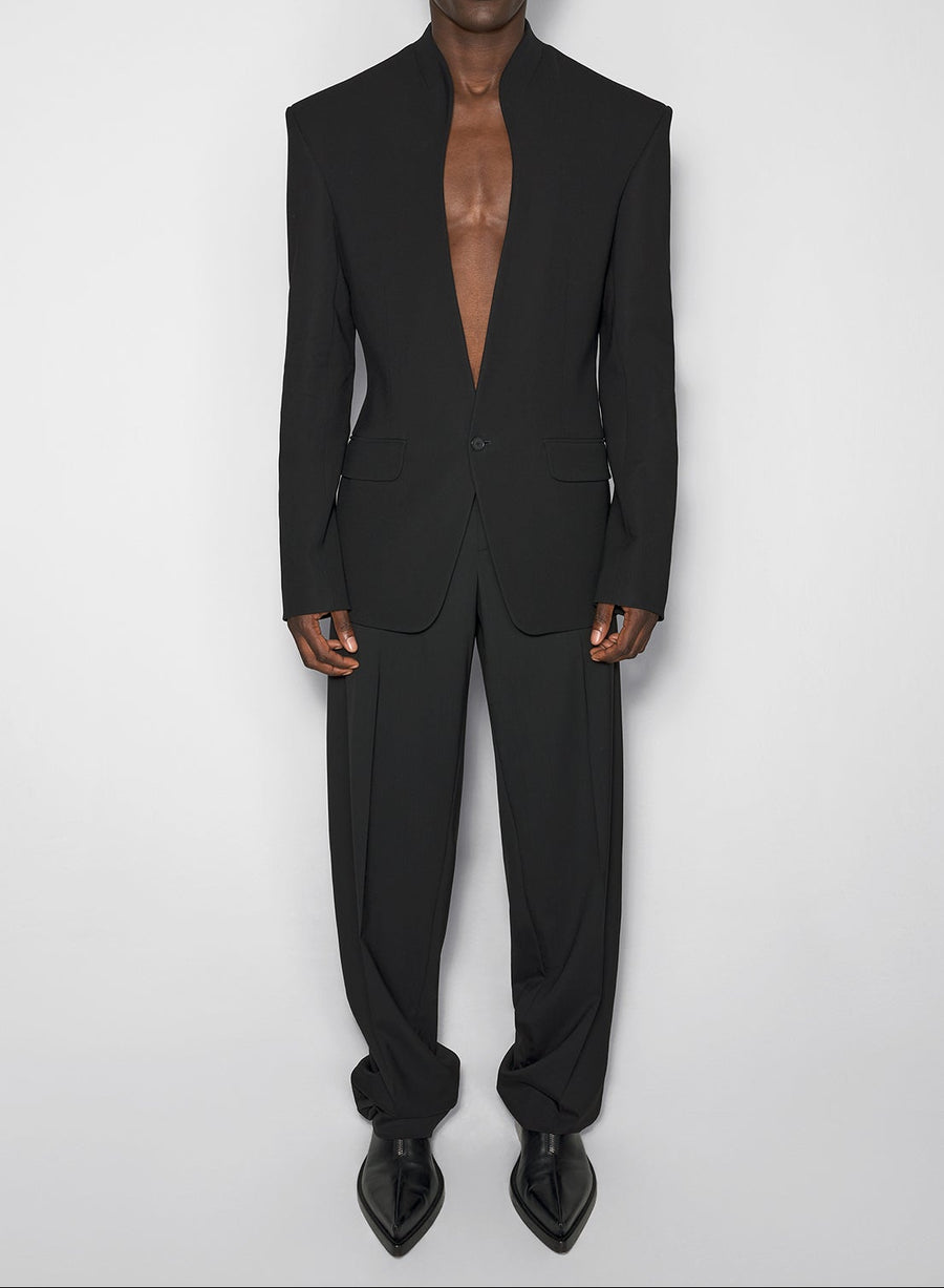 black collarless tailored jacket