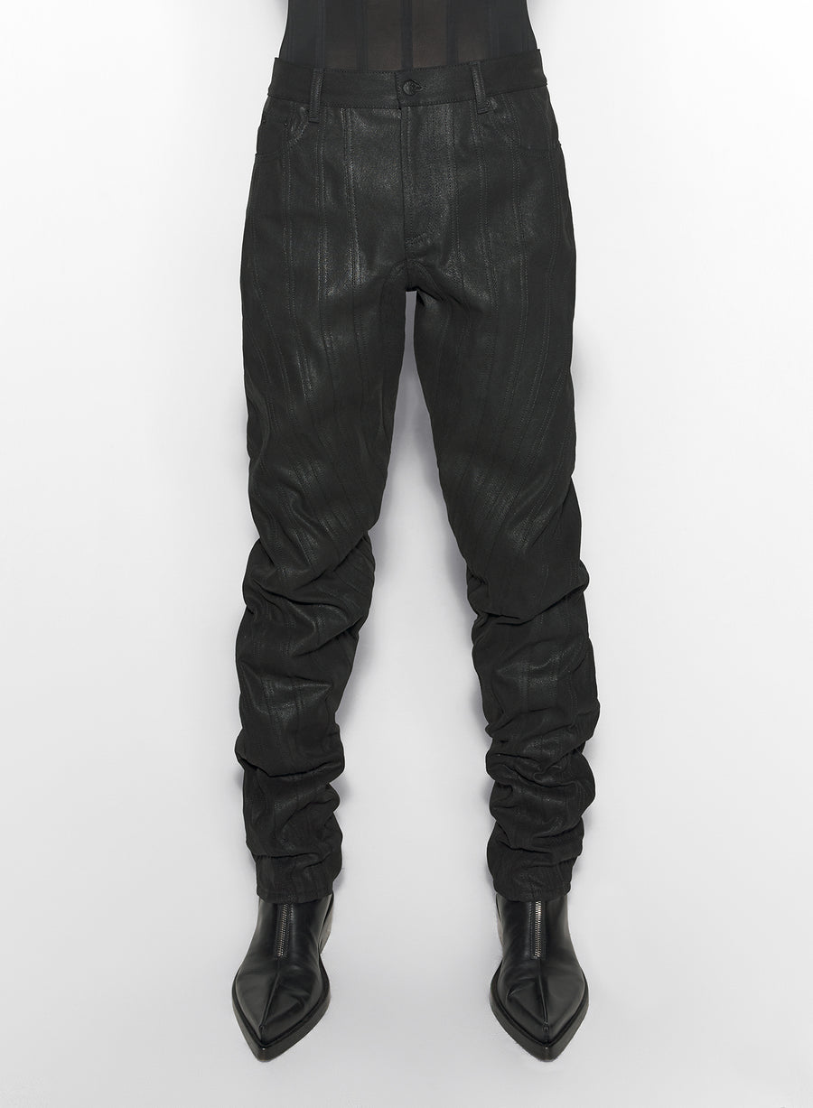 waxed black spiral baggy jeans