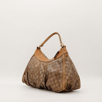Sac Gucci Hobo vue latérale silhouette souple occasion authentique — AMANA Vintage