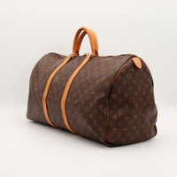 Louis Vuitton Keepall 55 vue de trois quarts toile Monogram patine caramel — AMANA Vintage