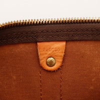 Date code FL0060 intérieur Louis Vuitton Keepall 55 doublure marron — AMANA Vintage