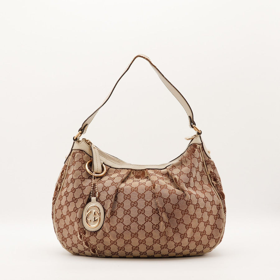 Sac Gucci Sukey toile monogrammée beige vue de face occasion authentique — AMANA Vintage