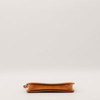 Base de la pochette Louis Vuitton Vernis bronze occasion authentique — AMANA Vintage