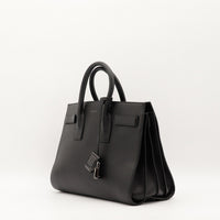Sac de Jour Small Saint Laurent cuir noir vue trois quarts occasion authentique — AMANA Vintage