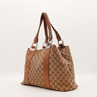 Tote Bag Bambou Gucci vue de trois quarts droite anses tressées cuir marron — AMANA Vintage