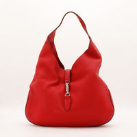 Hobo Hermès cuir grené rouge vue de face occasion authentique — AMANA Vintage