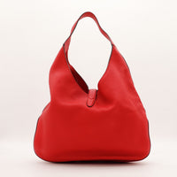 Hobo Hermès rouge vue de face arrière cuir grené — AMANA Vintage