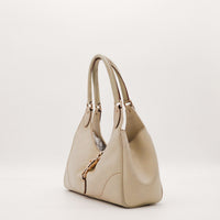 Sac Gucci New Jackie cuir taupe vue de trois quarts gauche — AMANA Vintage
