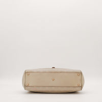 Vue du dessous Gucci New Jackie pieds métal argenté cuir taupe — AMANA Vintage
