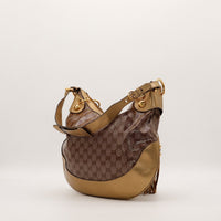Hobo Gucci Babouska bronze vue de trois quarts arrière — AMANA Vintage