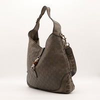 Sac Gucci New Jackie vue de profil cuir embossé occasion authentique — AMANA Vintage