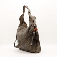 Sac Gucci New Jackie vue trois quarts pompons bambou occasion authentique — AMANA Vintage