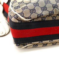 Détail coin et bande Web sac Gucci Hobo Web occasion authentique — AMANA Vintage