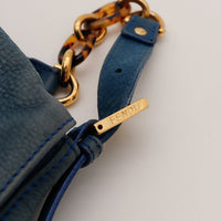 Détail chaîne écaille et attache bandoulière Fendi Mamma Baguette — AMANA Vintage