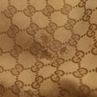 Détail toile monogrammée Gucci marque d'usage — AMANA Vintage
