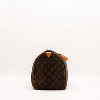 Vue de dessous Louis Vuitton Speedy 35 toile Monogramme fond — AMANA Vintage