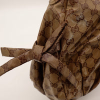 Détail nœud latéral toile monogrammée Gucci Hobo Web occasion authentique — AMANA Vintage