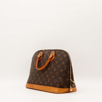 Sac Louis Vuitton Alma PM vue latérale zip doré occasion authentique — AMANA Vintage