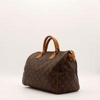 Louis Vuitton Speedy 30 vue trois quarts gauche toile monogramme marron — AMANA Vintage