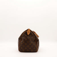 Vue de profil gauche Louis Vuitton Speedy 30 toile monogramme — AMANA Vintage