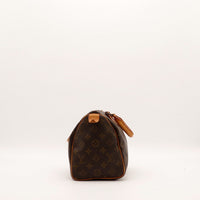 Vue de côté droit Louis Vuitton Speedy 25 tirette cadenas — AMANA Vintage