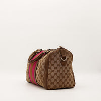 Sac Gucci Boston Web vue de trois quarts gauche toile GG canvas occasion — AMANA Vintage