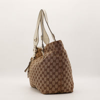 Vue de profil Tote Horsebit Gucci toile GG Canvas ivoire occasion — AMANA Vintage