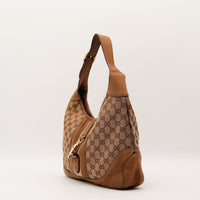 Sac Gucci New Jackie vue de profil gauche toile monogramme cuir nubuck tabac — AMANA Vintage