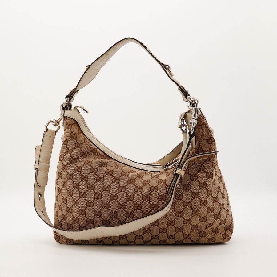 Sac Gucci Hobo Horsebit toile GG Canvas cuir ivoire vue de face occasion authentique — AMANA Vintage