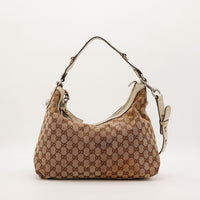 Gucci Hobo Horsebit toile GG Canvas vue de face cote droit occasion — AMANA Vintage