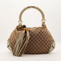 Sac Gucci Indy Hobo toile GG Canvas beige vue de face occasion authentique — AMANA Vintage