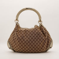 Gucci Indy Hobo vue de dos toile GG Canvas beige occasion — AMANA Vintage