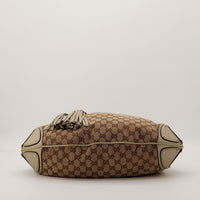 Gucci Indy Hobo vue du fond toile GG Canvas glands cuir beige — AMANA Vintage