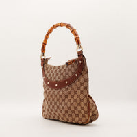 Gucci Hobo Bambou vue de côté gauche toile monogrammée et cuir marron — AMANA Vintage
