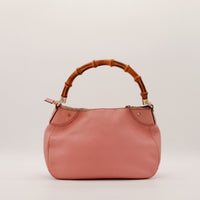 Vue arrière Gucci Hobo Bambou cuir rose sac à main vintage — AMANA Vintage