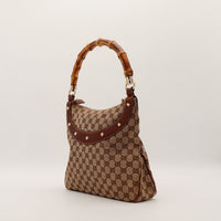 Vue de trois quarts gauche Gucci Hobo Bambou toile monogrammée — AMANA Vintage