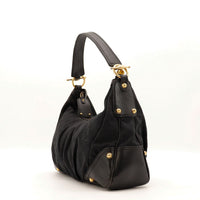 Vue de côté Gucci Indy Hobo noir rivets dorés — AMANA Vintage