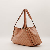 Gucci Hobo monogramme rose vue de trois quarts gauche occasion — AMANA Vintage