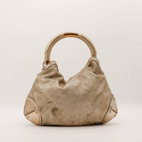 Gucci Indy Hobo vue de dos taches visibles sur le cuir monogrammé — AMANA Vintage