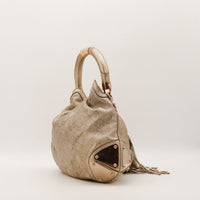 Gucci Indy Hobo vue de profil droit plaques métalliques coins — AMANA Vintage