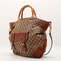 Vue de trois quarts Tote Bag Bambou Gucci toile monogrammée avec bandoulière — AMANA Vintage