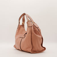 Hobo Gucci Stirrup vue de trois quarts droite cuir souple — AMANA Vintage