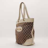 Gucci Tote Horsebit vue de trois quarts cuir ivoire canvas GG occasion — AMANA Vintage