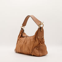 Sac Gucci Indy Hobo cuir camel vue de trois quarts gauche — AMANA Vintage