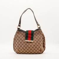 Hobo Web Gucci toile monogrammée bande Web verte rouge vue de face occasion authentique — AMANA Vintage